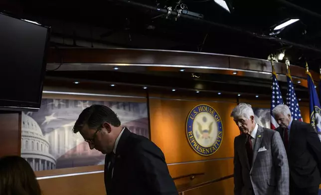 Speaker of the House Mike Johnson, R-La., left, House Small Business Committee Chairman Roger Williams, R-Texas, center, and House Majority Whip Tom Emmer, R-Minn., right, depart a news conference at the Capitol, Tuesday, May 6, 2025, in Washington. (AP Photo/Rod Lamkey, Jr.)