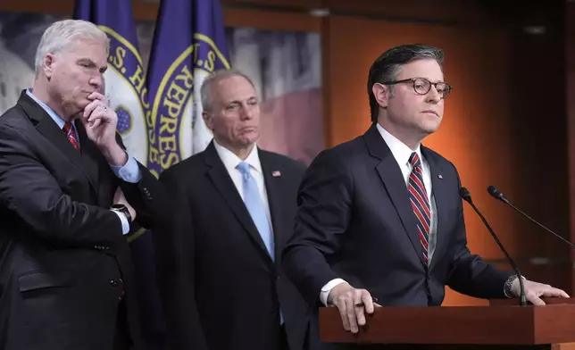 FILE - Speaker of the House Mike Johnson, R-La., joined from left by House Majority Whip Tom Emmer, R-Minn., and House Majority Leader Steve Scalise, R-La., talks to reporters at the Capitol in Washington, April 8, 2025. (AP Photo/J. Scott Applewhite, File)