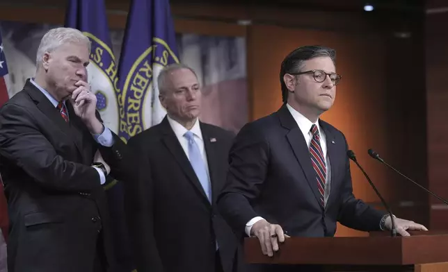 FILE - Speaker of the House Mike Johnson, R-La., joined from left by House Majority Whip Tom Emmer, R-Minn., and House Majority Leader Steve Scalise, R-La., talks to reporters about his push for a House-Senate compromise budget resolution to advance President Donald Trump's agenda, even with opposition from hard-line conservative Republicans, at the Capitol in Washington, April 8, 2025. (AP Photo/J. Scott Applewhite, File)