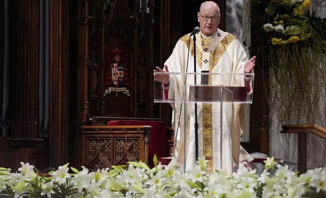 FILE - Cardinal Timothy Dolan speaks during a Mass for the late Pope Francis at St. Patrick's Cathedral, April 22, 2025, in New York. (AP Photo/Julia Demaree Nikhinson, File)