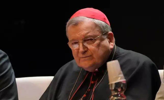 FILE - Cardinal Raymond Burke attends the conference "The synodal Babel" in a theater near the Vatican, Oct. 3, 2023, after a letter he signed with others and containing questions to Pope Francis about the upcoming synod of bishops was made public. (AP Photo/Gregorio Borgia, File)