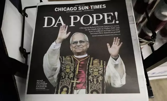 A Chicago Sun-Times newspaper front page shows "DA POPE!" at a grocery store in Mount Prospect, Ill., Thursday, May 9, 2025. (AP Photo/Nam Y. Huh)