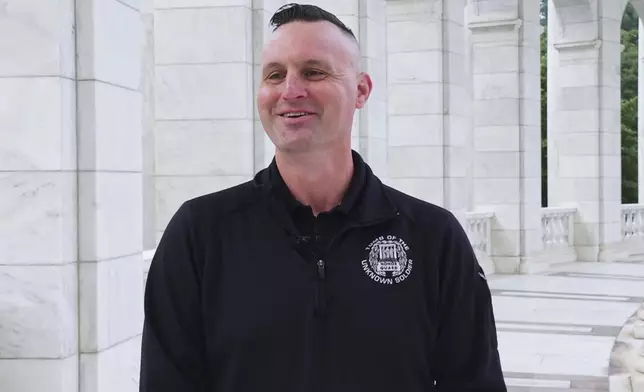 Army Sgt. 1st Class Andrew Jay speaks during an interview with The Associated Press, Thursday, May 15, 2025, at Arlington National Cemetery in Arlington, Va. (AP Photo/Mike Pesoli)