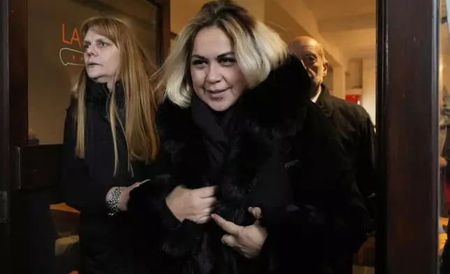 Veronica Ojeda, former partner of the late soccer star Diego Maradona, leaves a cafe during a break in the trial of health professionals accused of negligence in his death, in San Isidro, on the outskirts of Buenos Aires, Argentina, Tuesday, May 27, 2025. (AP Photo/Gustavo Garello)