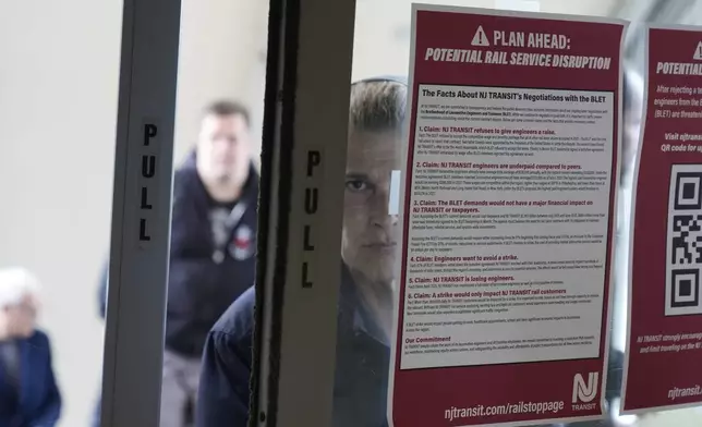 An sign advises commuters of potential NJ Transit service disruptions at the Secaucus Junction station in Secaucus, N.J., Wednesday, May 14, 2025. (AP Photo/Seth Wenig)