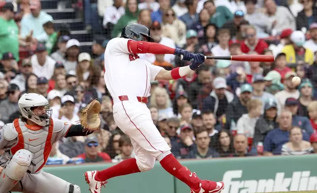 Boston Red Sox's Marcelo Mayer hits for a ground out single during the fourth inning of a baseball game against the Baltimore Orioles, Sunday, May 25, 2025, in Boston. (AP Photo/Mark Stockwell)
