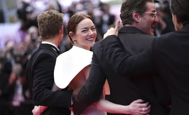 Austin Butler, from left, Emma Stone, Pedro Pascal and Clifton Collins Jr. poses for photographers upon arrival at the premiere of the film 'Eddington' at the 78th international film festival, Cannes, southern France, Friday, May 16, 2025. (Photo by Scott A Garfitt/Invision/AP)