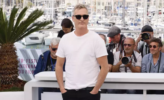 Joaquin Phoenix poses for photographers at the photo call for the film 'Eddington' at the 78th international film festival, Cannes, southern France, Saturday, May 17, 2025. (Photo by Joel C Ryan/Invision/AP)