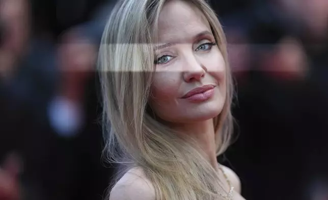 Angelina Jolie poses for photographers upon arrival at the premiere of the film 'Eddington' at the 78th international film festival, Cannes, southern France, Friday, May 16, 2025. (Photo by Lewis Joly/Invision/AP)