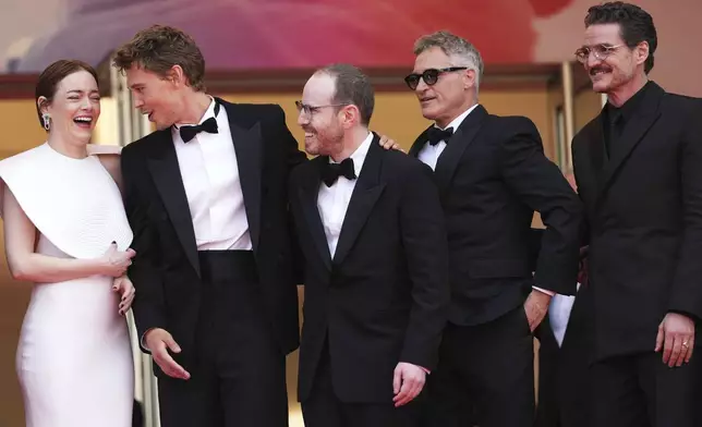 Emma Stone, from left, Austin Butler, director Ari Aster, Joaquin Phoenix and Pedro Pascal pose for photographers upon arrival at the premiere of the film 'Eddington' at the 78th international film festival, Cannes, southern France, Friday, May 16, 2025. (Photo by Scott A Garfitt/Invision/AP)