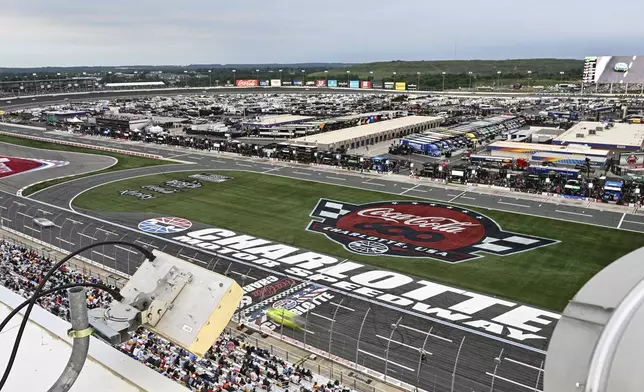 Drivers compete down the front stretch during a NASCAR Cup Series auto race at Charlotte Motor Speedway, Sunday, May 25, 2025, in Concord, N.C. (AP Photo/Matt Kelley)