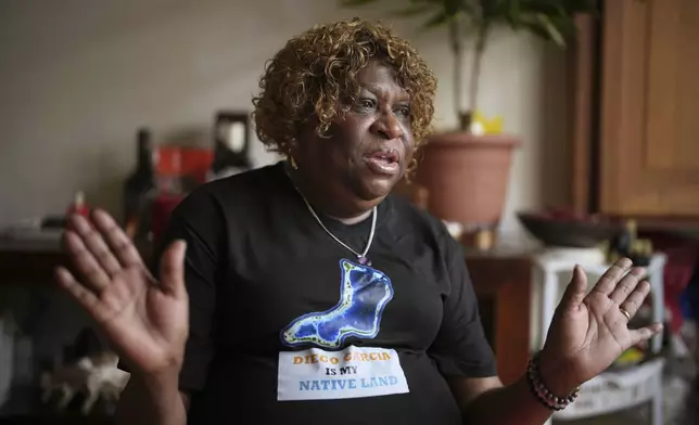 Chagossian Bernadette Dugasse speaks, during an interview with The Associated Press, at her home in London, Tuesday, March 25, 2025. (AP Photo/Kin Cheung)