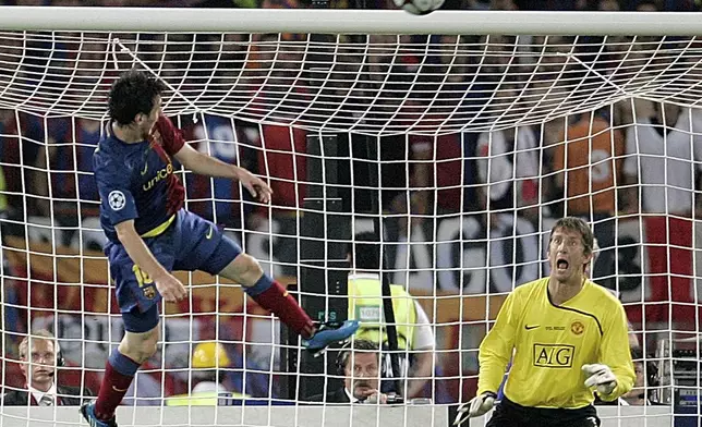 FILE - Barcelona's Lionel Messi, left, scores on a header during the UEFA Champions League final soccer match between Manchester United and Barcelona in Rome, May 27, 2009. Barcelona won 2-0. (AP Photo/Gregorio Borgia, File)