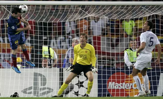 FILE - Barcelona's Lionel Messi, left, scores on a header during the UEFA Champions League final soccer match between Manchester United and Barcelona in Rome, May 27, 2009. (AP Photo/Gregorio Borgia, File)