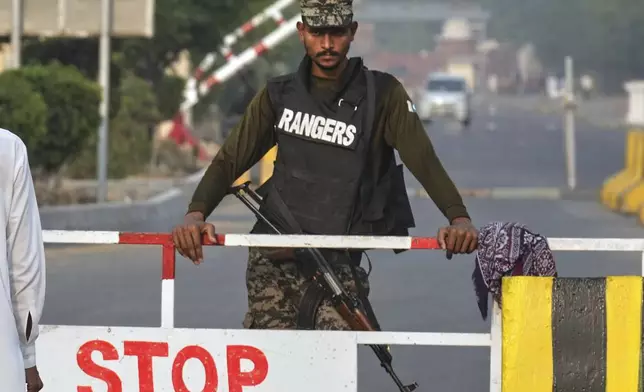 A Pakistani paramilitary soldier stands guard at a checkpoint in Wagah, a joint border crossing point on the Pakistan and India border, near Lahore, Pakistan, Wednesday, April 30, 2025.(AP Photo/K.M. Chaudary)