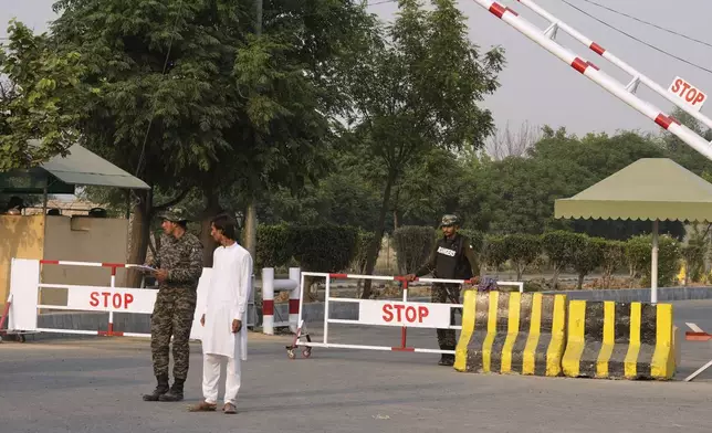Pakistani paramilitary soldiers stand guard at a checkpoint in Wagah, a joint border crossing point on the Pakistan and India border, near Lahore, Pakistan, Wednesday, April 30, 2025.(AP Photo/K.M. Chaudary)