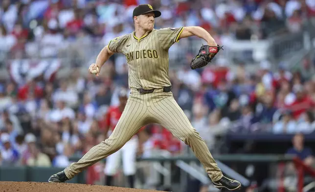 San Diego Padres pitcher Nick Pivetta delivers in the third inning of a baseball game against the Atlanta Braves, Friday, May 23, 2025, in Atlanta. (AP Photo/Colin Hubbard)