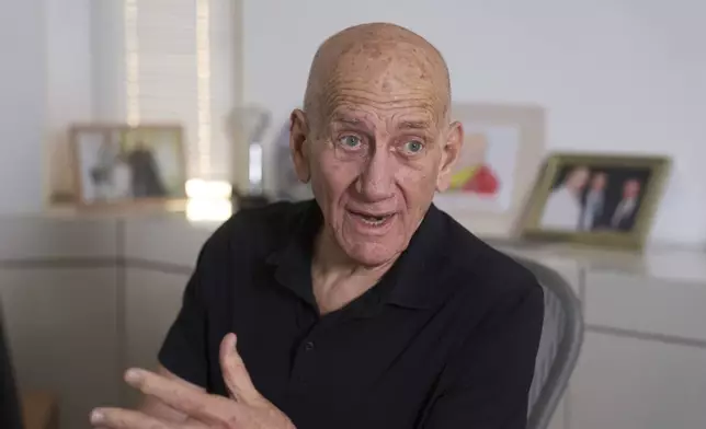 Former Israeli Prime Minister Ehud Olmert during an interview with The Associated Press in his office in Tel Aviv, Israel, Thursday, May 22, 2025. (AP Photo/Ariel Schalit)