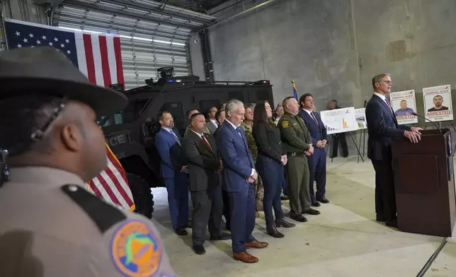 Larry Keefe, executive director of the State Board of Immigration Enforcement, speaks during a press conference with Gov. Ron DeSantis at the South Florida office of U.S. Immigration and Customs Enforcement and Enforcement and Removal Operations, Thursday, May 1, 2025, in Miramar, Fla. (AP Photo/Rebecca Blackwell)