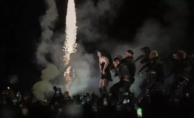 Lady Gaga performs during her free concert on Copacabana Beach in Rio de Janeiro, Saturday, May 3, 2025. (AP Photo/Silvia Izquierdo)