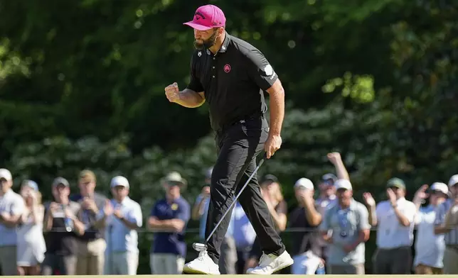 Jon Rahm, of Spain, celebrates after a birdie on the 11th hole during the final round of the PGA Championship golf tournament at the Quail Hollow Club, Sunday, May 18, 2025, in Charlotte, N.C. (AP Photo/George Walker IV)