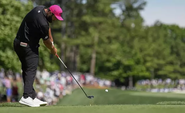 Jon Rahm, of Spain, hits his tee shot on the eighth hole during the final round of the PGA Championship golf tournament at the Quail Hollow Club, Sunday, May 18, 2025, in Charlotte, N.C. (AP Photo/George Walker IV)