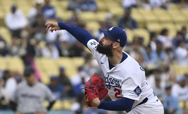 Los Angeles Dodgers pitcher Tony Gonsolin (26) throws during in the first inning of a baseball game against the Miami Marlins, Wednesday, April 30, 2025, in Los Angeles. (AP Photo/Wally Skalij)
