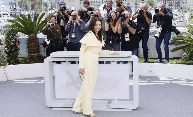 Jury member Juliette Binoche poses for photographers at the jury photo call at the 78th international film festival, Cannes, southern France, Tuesday, May 13, 2025. (Photo by Joel C Ryan/Invision/AP)
