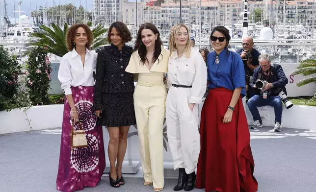 Jury president Juliette Binoche, center, poses with jury members Leila Slimani, from left, Halle Berry, Alba Rohrwacher, and Payal Kapadia at the jury photo call at the 78th international film festival, Cannes, southern France, Tuesday, May 13, 2025. (Photo by Joel C Ryan/Invision/AP)