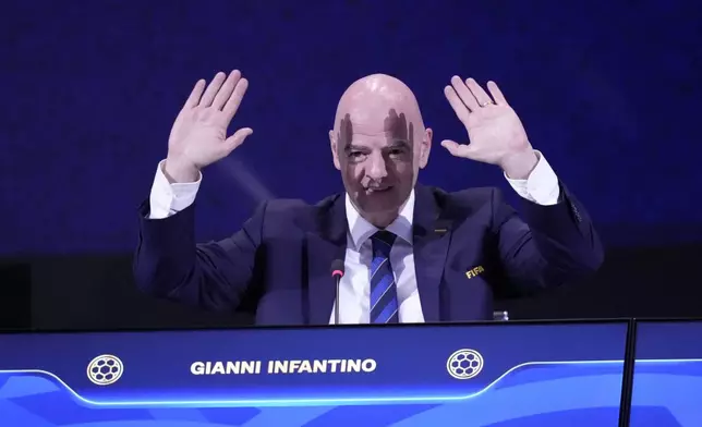 FIFA President Gianni Infantino waves at the end of FIFA's 75th Congress at the Conmebol Convention Center in Luque, Paraguay, Thursday, May 15, 2025. (AP Photo/Fernando Calistro)