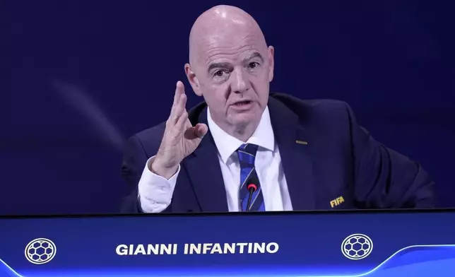 FIFA President Gianni Infantino points at the end of FIFA's 75th Congress at the Conmebol Convention Center in Luque, Paraguay, Thursday, May 15, 2025. (AP Photo/Fernando Calistro)