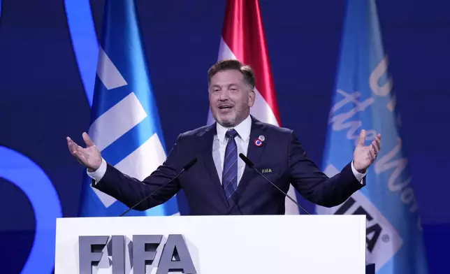 Conmebol President Alejandro Dominguez addresses FIFA's 75th Congress at the Conmebol Convention Center in Luque, Paraguay, Thursday, May 15, 2025. (AP Photo/Fernando Calistro)