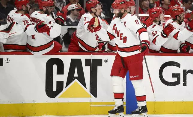 Carolina Hurricanes center Jordan Staal (11) celebrates his goal in the first period of Game 5 of a second-round NHL hockey playoff series against the Washington Capitals Thursday, May 15, 2025, in Washington. (AP Photo/Nick Wass)