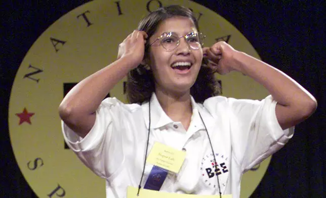 FILE – In this June 3, 1999 file photo Nupur Lala, 14, from Tampa, Fla. reacts upon winning the 72nd annual National Spelling Bee in Washington after correctly spelling "logorrhea." (AP Photo/Ron Edmonds, File)