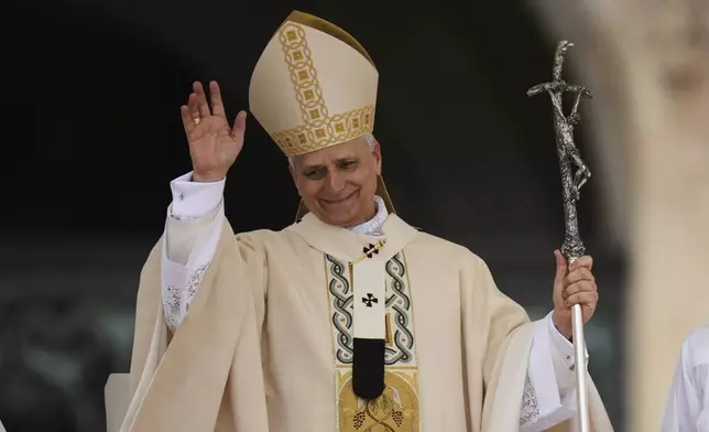 Pope Leo XIV holds Mass during the formal inauguration of his pontificate in St. Peter's Square attended by heads of state, royalty and ordinary faithful, Sunday, May 18, 2025. (AP Photo/Alessandra Tarantino)