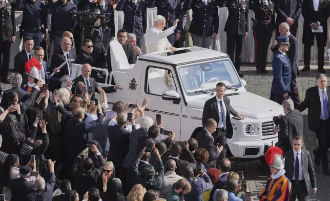 Pope Leo XIV on his popemobile tours St. Peter's Square at the Vatican prior to the inaugural Mass of his pontifcate, Sunday, May 18, 2025. (AP Photo/Jacquelyn Martin, Pool)