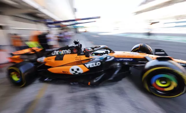 McLaren driver Oscar Piastri of Australia steers his car out of garage during the second free practice ahead of the Spanish Grand Prix Formula One race at the Barcelona Catalunya racetrack in Montmelo, near Barcelona, Spain, Friday, May 30, 2025. (AP Photo/Joan Monfort)