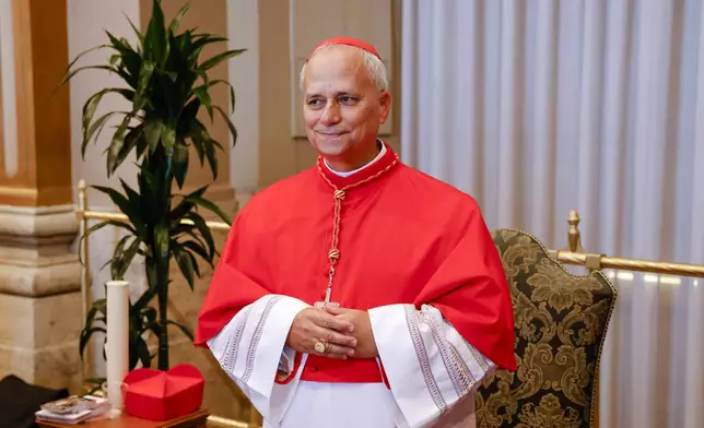FILE - Cardinal Robert Francis Prevost, Prefect of the Dicastery for Bishops, poses for a photo at the end of the consistory where Pope Francis elevated 21 new cardinals in St. Peter's Square at The Vatican, Sept. 30, 2023. (AP Photo/Riccardo De Luca, File)
