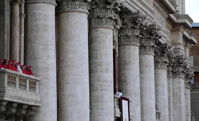 Pope Leo XIV appears on the balcony of St Peter's Basilica after his election, at the Vatican, Thursday, May 8, 2025. (AP Photo/Gregorio Borgia)