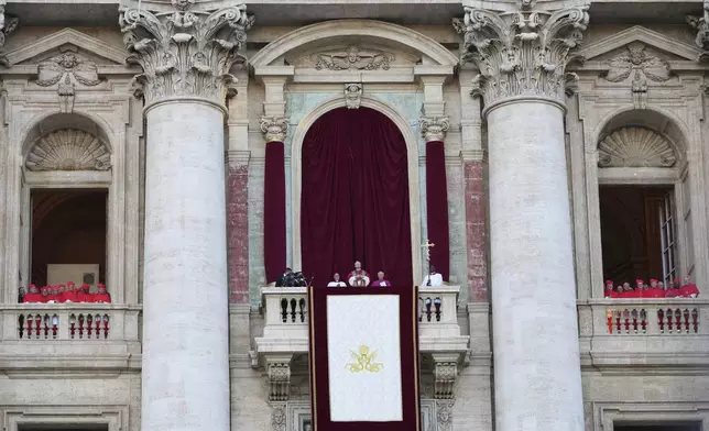 Newly elected Pope Leo XIV appears at the balcony of St. Peter's Basilica at the Vatican, Thursday, May 8, 2025. (AP Photo/Alessandra Tarantino)