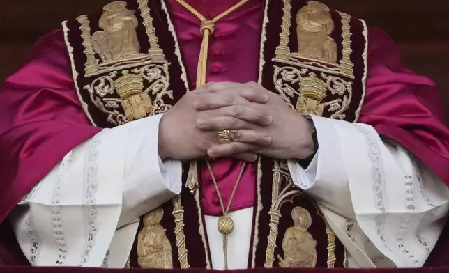 Newly elected Pope Leo XIV appears at the balcony of St. Peter's Basilica at the Vatican, Thursday, May 8, 2025. (AP Photo/Alessandra Tarantino)