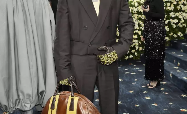 Bad Bunny attends The Metropolitan Museum of Art's Costume Institute benefit gala celebrating the opening of the "Superfine: Tailoring Black Style" exhibition on Monday, May 5, 2025, in New York. (Photo by Evan Agostini/Invision/AP)