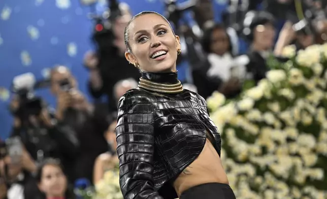Miley Cyrus attends The Metropolitan Museum of Art's Costume Institute benefit gala celebrating the opening of the "Superfine: Tailoring Black Style" exhibition on Monday, May 5, 2025, in New York. (Photo by Evan Agostini/Invision/AP)