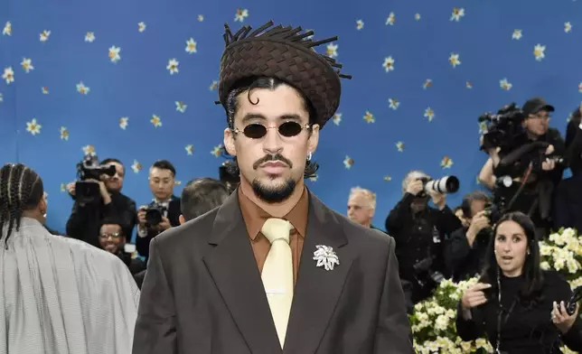 Bad Bunny attends The Metropolitan Museum of Art's Costume Institute benefit gala celebrating the opening of the "Superfine: Tailoring Black Style" exhibition on Monday, May 5, 2025, in New York. (Photo by Evan Agostini/Invision/AP)