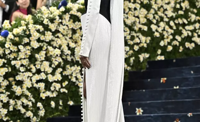Zoe Saldana attends The Metropolitan Museum of Art's Costume Institute benefit gala celebrating the opening of the "Superfine: Tailoring Black Style" exhibition on Monday, May 5, 2025, in New York. (Photo by Evan Agostini/Invision/AP)