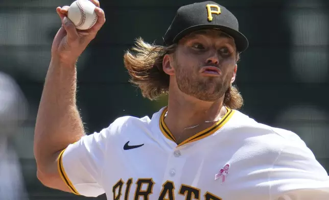 Pittsburgh Pirates pitcher Carmen Mlodzinski delivers during the first inning of a baseball game against the Atlanta Braves in Pittsburgh, Sunday, May 11, 2025. (AP Photo/Gene J. Puskar)