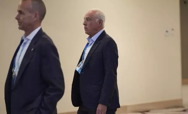Philadelphia Eagles owner Jeffrey Lurie, right, arrives ahead of a NFL football owners meeting, Tuesday, May 20, 2025, in Eagan, Minn. (AP Photo/Abbie Parr)