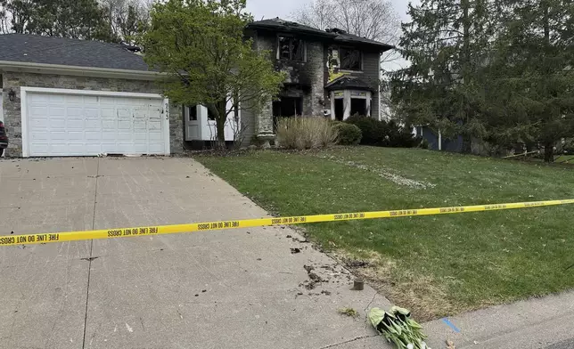 The home of Jill Sobule showed heavy damage on Friday, May 2, 2025, in Woodbury, Minn., a day after a fire engulfed the house, killing the 66-year-old singer-songwriter. (AP Photo/Amy Forliti)