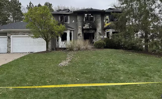The home of Jill Sobule showed heavy damage on Friday, May 2, 2025, in Woodbury, Minn., a day after a fire engulfed the house, killing the 66-year-old singer-songwriter. (AP Photo/Amy Forliti) (AP Photo/Amy Forliti)