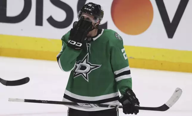 Dallas Stars left wing Jason Robertson reacts after losing Game 5 of the Western Conference finals in the NHL hockey Stanley Cup playoffs against the Dallas Stars, Thursday, May 29, 2025, in Dallas. (AP Photo/Gareth Patterson)